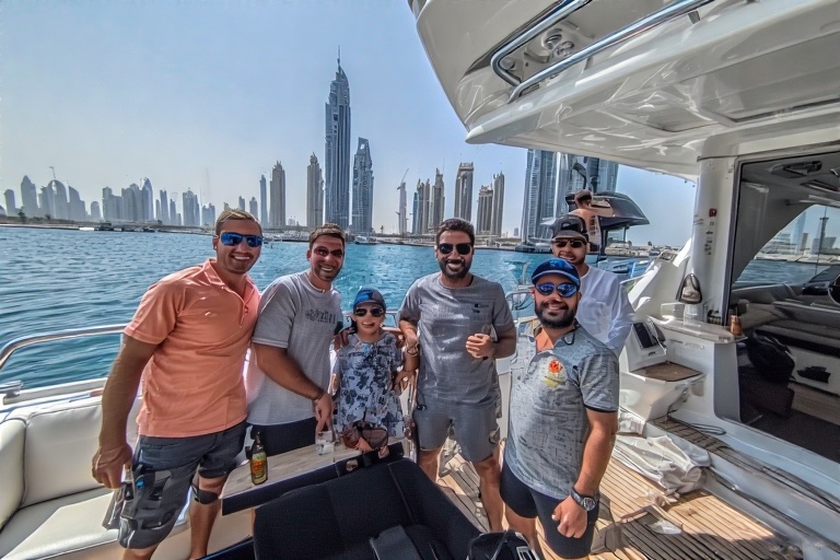 Royal Rams Crew Guiding Guests on Dubai Yacht Tour